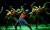 Several dancers flex their arms overhead